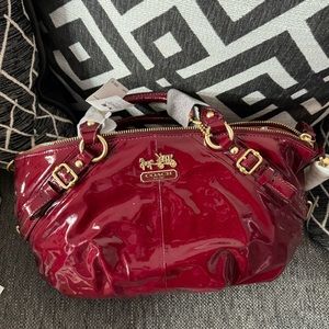 Brand new with tags Coach Madison in crimson. MSRP $358
